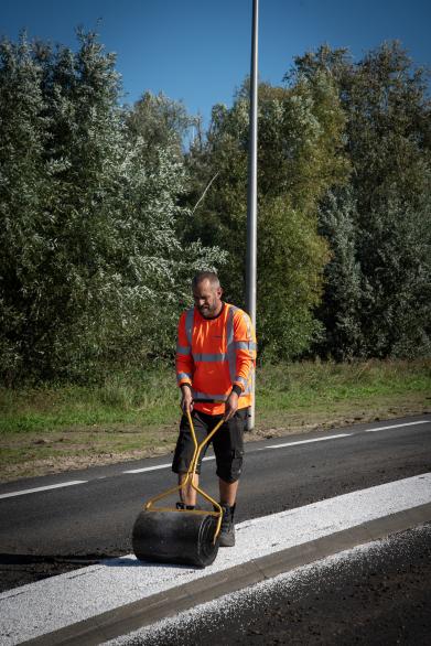 Slijtlaag | Buitengewoon Slijtlaag Luxovit split vluchtheuvels reflecterend duurzaam veilig veiligheid Wolfgang Pauliweg Utrecht